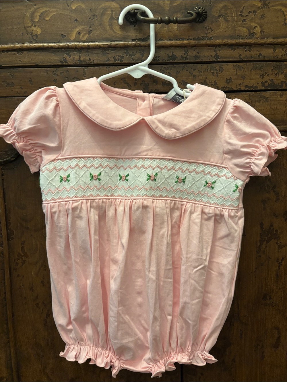 Pink Smocked Baby One-Piece Bodysuit with Peter Pan Collar